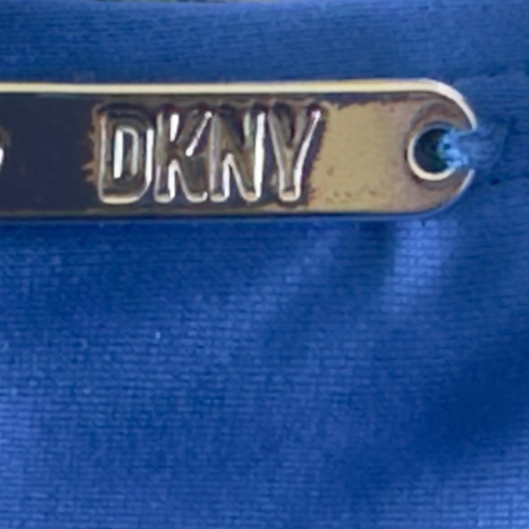 New DKNY
Ruffle Plunge Underwire Tummy Control One-Piece Blue Swimsuit 8 - Picture 8 of 9